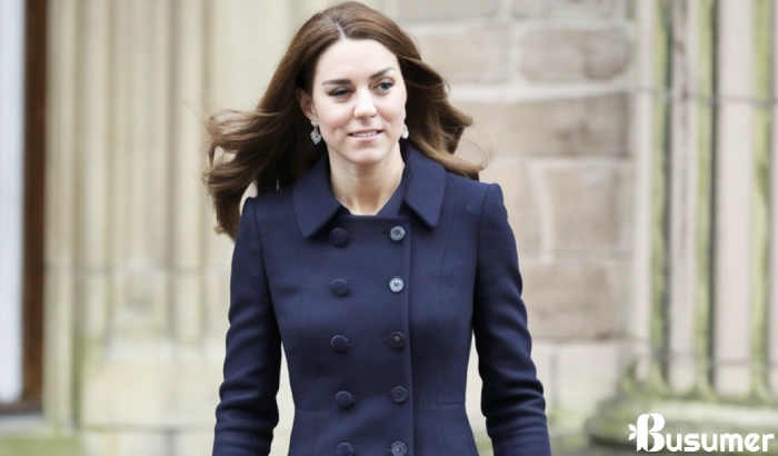 Portrait of Kate Middleton in elegant attire at Windsor Castle, exuding strength and renewed focus as she returns to royal duties.